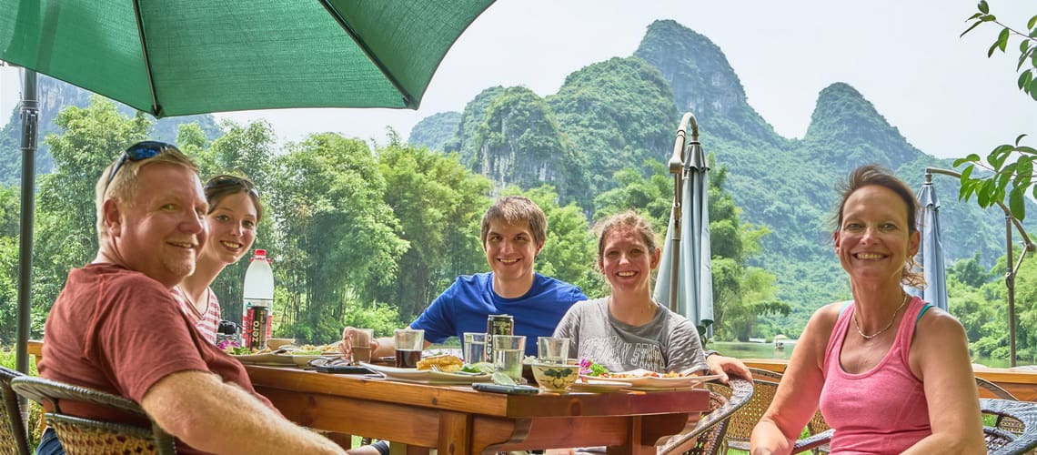 Guilin Yangshuo Mountain Retreat guests lunch by Yulong River best Yangshuo hotels TripAdvisor