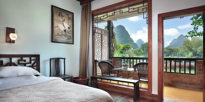 Yangshuo Mountain Retreat Yulong River corner room with oversize balcony.